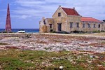 Red Obelisk and abandoned Building