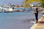 Boy with a kind of fishing rod